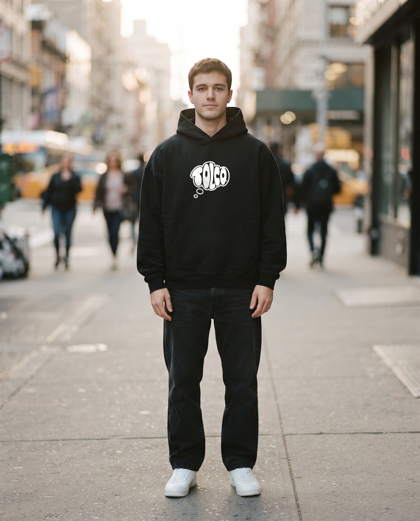 TOLCO on-model: TOLCO. - CORE - Heavyweight Hoodie - Black, front view, worn on the street