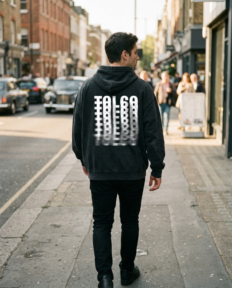 TOLCO on-model: TOLCO. - DRIFT - Snow Washed Hoodie - Black Beauty, back view, worn on the street