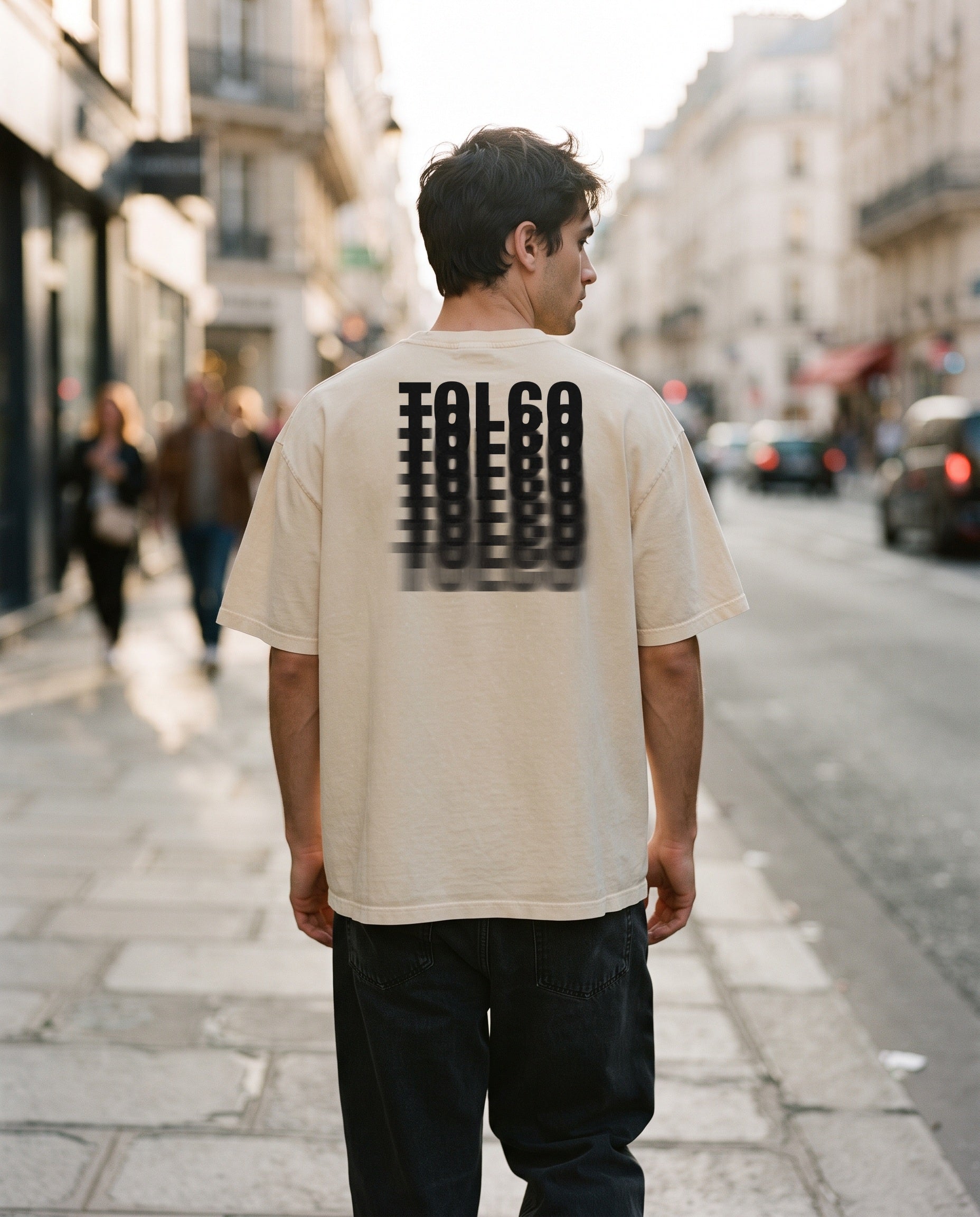 TOLCO on-model: TOLCO. - DRIFT - Oversized Cotton T - Apricot, back view, worn on the street