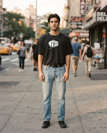 TOLCO on-model: TOLCO. - CORE - Pure Cotton T, front view, worn on the street